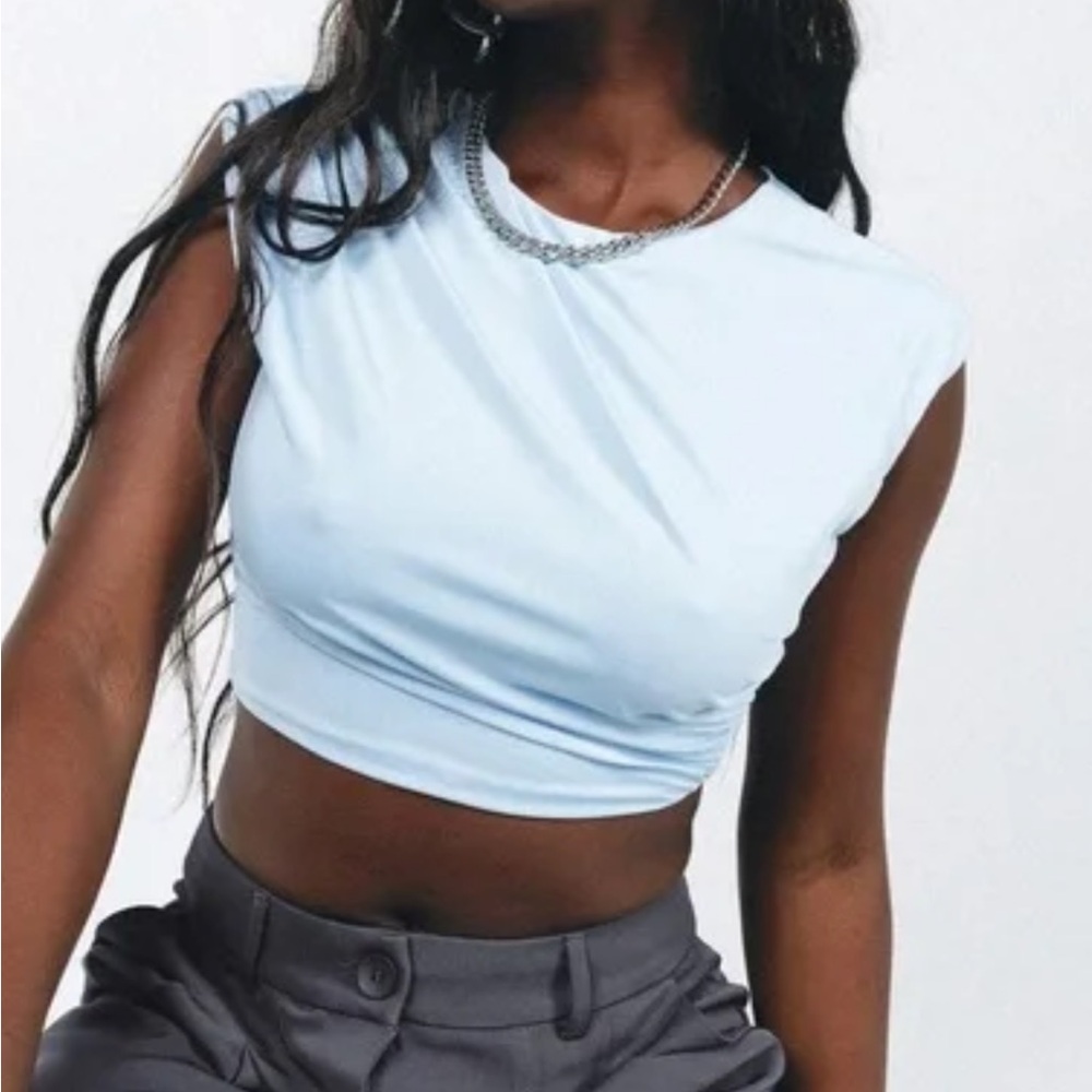Princess Polly Light blue crop tee NWT perfect condition size 4 SMALL